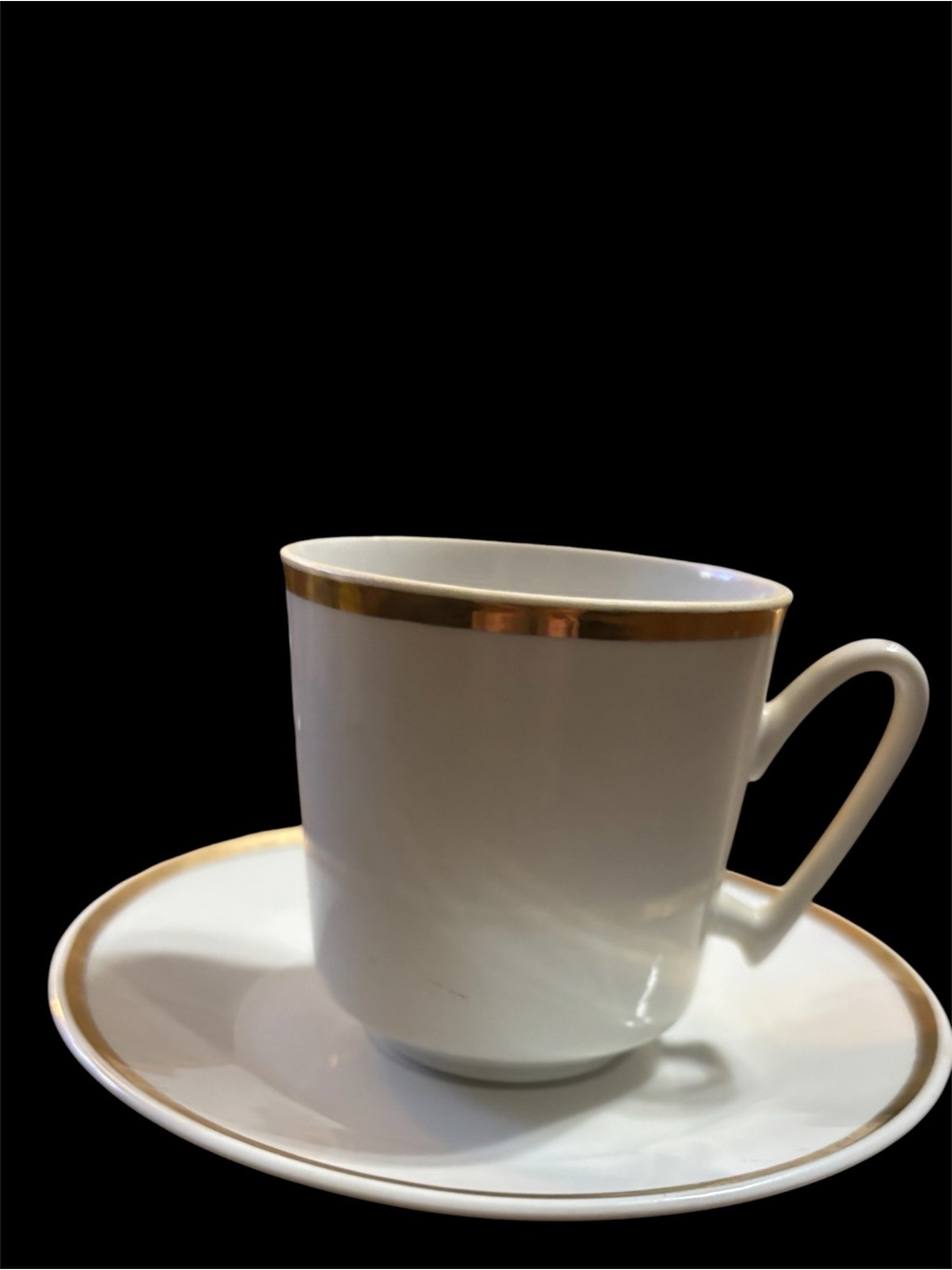 Classic White Porcelain Teacup & Saucer with Gold Trim. China